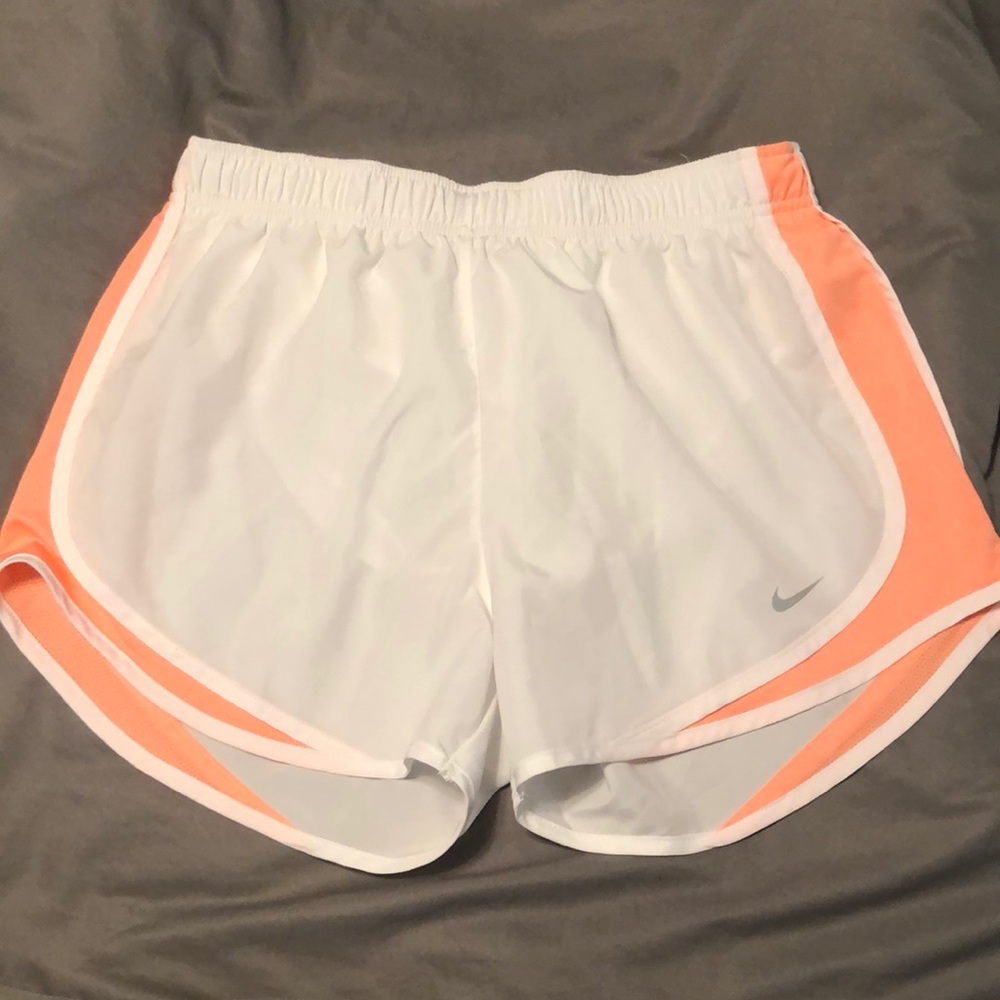 white & coral nike shorts
